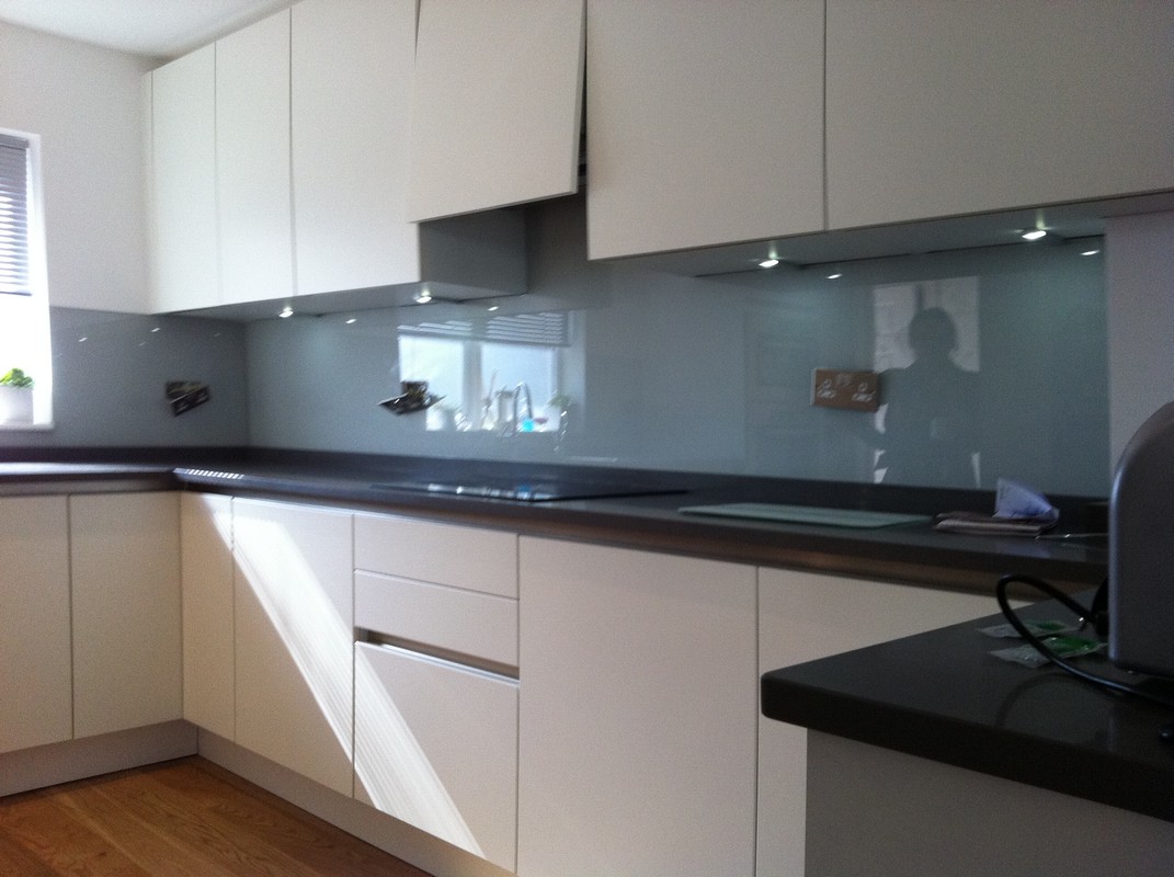 Grey glass kitchen splashback with LED lighting in Bletchley